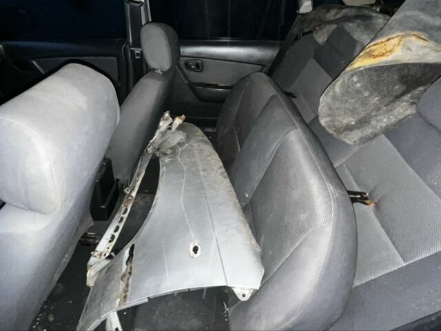 Сірий Деу Нексія, об'ємом двигуна 1.5 л та пробігом 200 тис. км за 1000 $, фото 5 на Automoto.ua