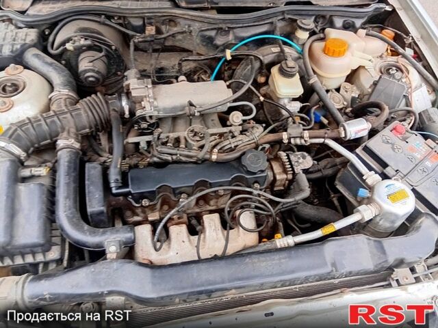 Серый Дэу Нексия, объемом двигателя 1.5 л и пробегом 217 тыс. км за 1880 $, фото 4 на Automoto.ua