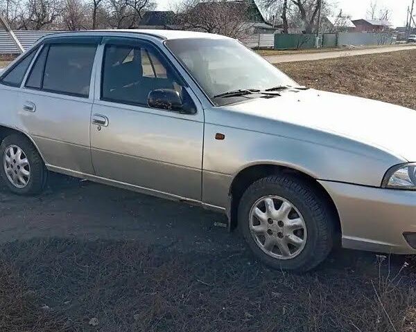 Сірий Деу Нексія, об'ємом двигуна 1.5 л та пробігом 312 тис. км за 1202 $, фото 5 на Automoto.ua