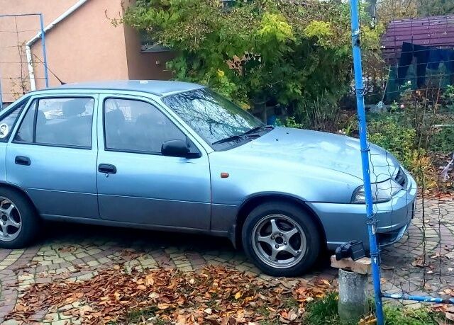 Серый Дэу Нексия, объемом двигателя 1.6 л и пробегом 192 тыс. км за 1999 $, фото 2 на Automoto.ua
