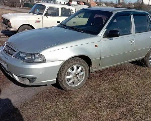 Сірий Деу Нексія, об'ємом двигуна 1.5 л та пробігом 312 тис. км за 1202 $, фото 4 на Automoto.ua