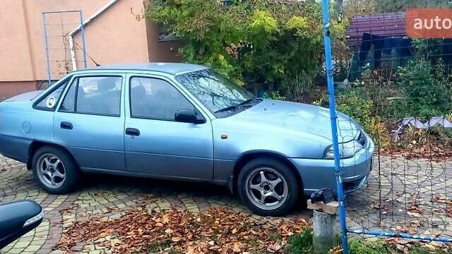 Сірий Деу Нексія, об'ємом двигуна 1.6 л та пробігом 192 тис. км за 1999 $, фото 1 на Automoto.ua