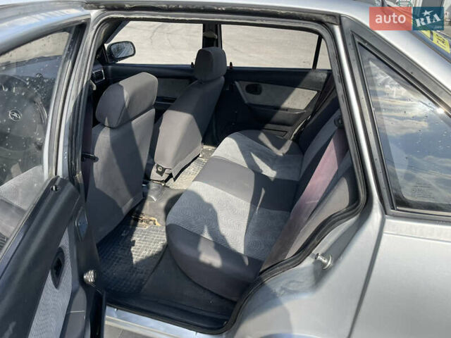 Серый Дэу Нексия, объемом двигателя 1.6 л и пробегом 185 тыс. км за 1600 $, фото 9 на Automoto.ua