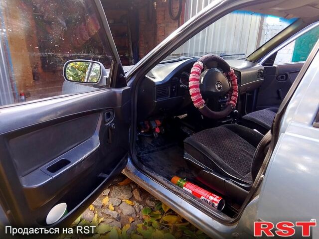 Сірий Деу Нексія, об'ємом двигуна 1.5 л та пробігом 487 тис. км за 1000 $, фото 1 на Automoto.ua