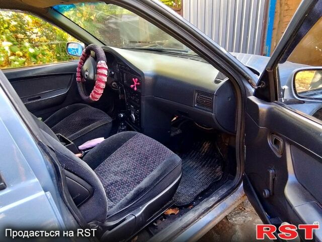 Сірий Деу Нексія, об'ємом двигуна 1.5 л та пробігом 487 тис. км за 1000 $, фото 3 на Automoto.ua