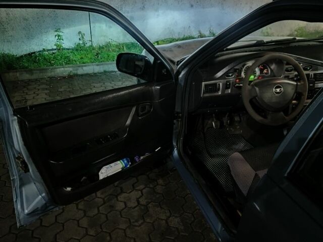 Сірий Деу Нексія, об'ємом двигуна 1.6 л та пробігом 332 тис. км за 1999 $, фото 4 на Automoto.ua