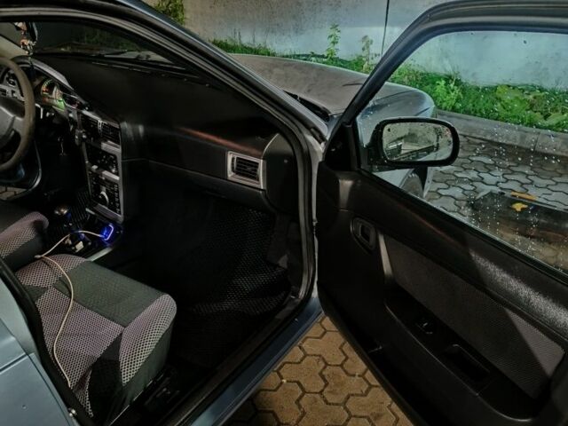 Сірий Деу Нексія, об'ємом двигуна 1.6 л та пробігом 332 тис. км за 1999 $, фото 6 на Automoto.ua