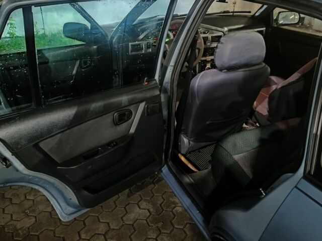 Сірий Деу Нексія, об'ємом двигуна 1.6 л та пробігом 332 тис. км за 1999 $, фото 5 на Automoto.ua