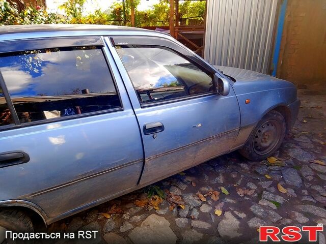 Сірий Деу Нексія, об'ємом двигуна 1.5 л та пробігом 487 тис. км за 1000 $, фото 9 на Automoto.ua