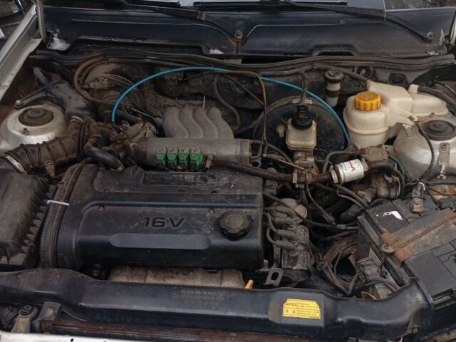 Сірий Деу Нексія, об'ємом двигуна 1.6 л та пробігом 200 тис. км за 949 $, фото 4 на Automoto.ua