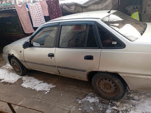 Сірий Деу Нексія, об'ємом двигуна 1.6 л та пробігом 200 тис. км за 949 $, фото 5 на Automoto.ua