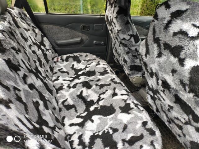 Синий Дэу Нексия, объемом двигателя 1.5 л и пробегом 234 тыс. км за 699 $, фото 3 на Automoto.ua