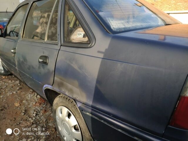 Синий Дэу Нексия, объемом двигателя 1.5 л и пробегом 234 тыс. км за 699 $, фото 1 на Automoto.ua