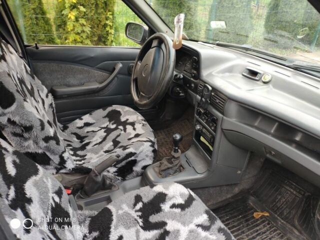 Синий Дэу Нексия, объемом двигателя 1.5 л и пробегом 234 тыс. км за 699 $, фото 2 на Automoto.ua