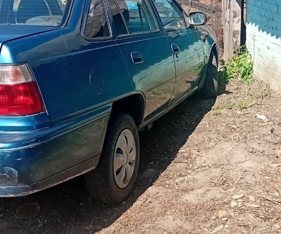 Синий Дэу Нексия, объемом двигателя 7 л и пробегом 629 тыс. км за 710 $, фото 2 на Automoto.ua
