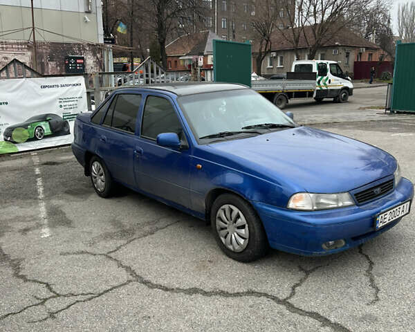 Синий Дэу Нексия, объемом двигателя 1.5 л и пробегом 237 тыс. км за 1500 $, фото 2 на Automoto.ua