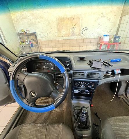 Синий Дэу Нексия, объемом двигателя 1.5 л и пробегом 250 тыс. км за 1400 $, фото 3 на Automoto.ua