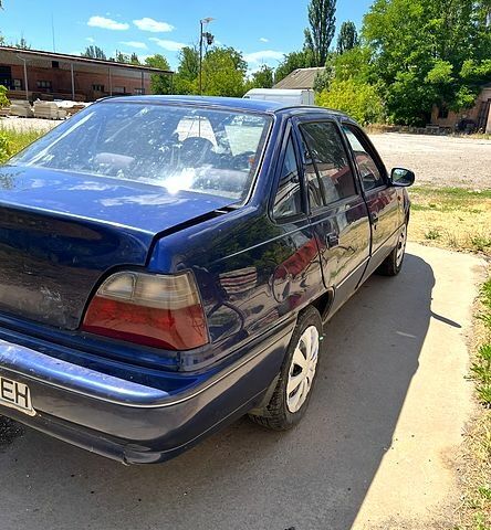 Синий Дэу Нексия, объемом двигателя 1.5 л и пробегом 250 тыс. км за 1400 $, фото 5 на Automoto.ua