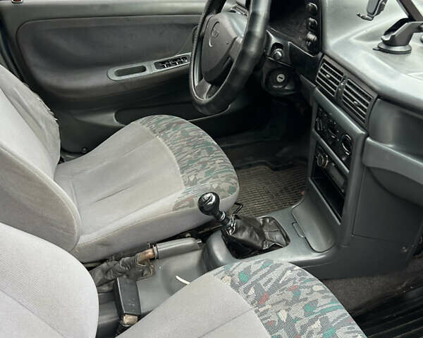 Синий Дэу Нексия, объемом двигателя 1.5 л и пробегом 237 тыс. км за 1500 $, фото 12 на Automoto.ua