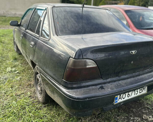 Дэу Нексия 2005 в Ужгороде на Automoto.ua Синий Дэу Нексия, объемом двигателя 1.5 л и пробегом 250 тыс. км за 350 $, фото 4 на Automoto.ua