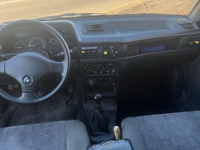 Синий Дэу Нексия, объемом двигателя 1.5 л и пробегом 312 тыс. км за 1700 $, фото 2 на Automoto.ua