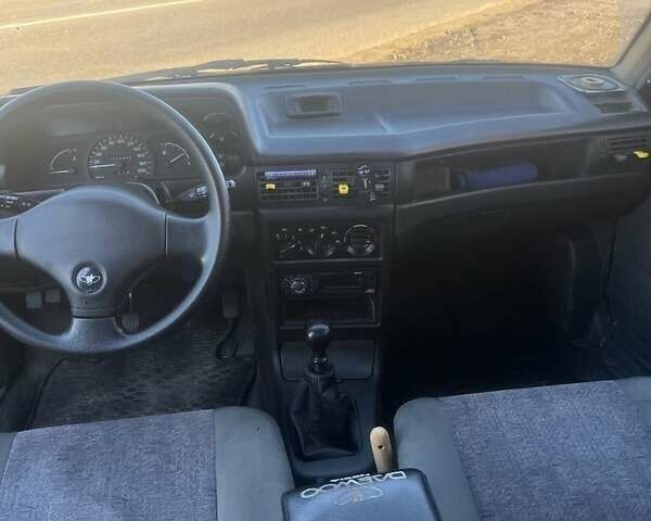 Синий Дэу Нексия, объемом двигателя 1.5 л и пробегом 312 тыс. км за 1700 $, фото 1 на Automoto.ua