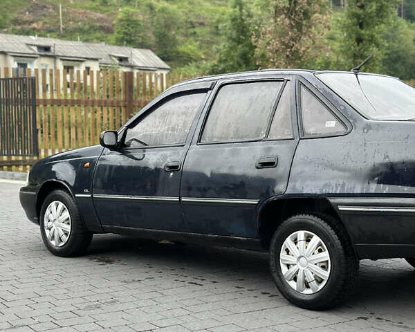 Синий Дэу Нексия, объемом двигателя 1.5 л и пробегом 200 тыс. км за 1150 $, фото 5 на Automoto.ua