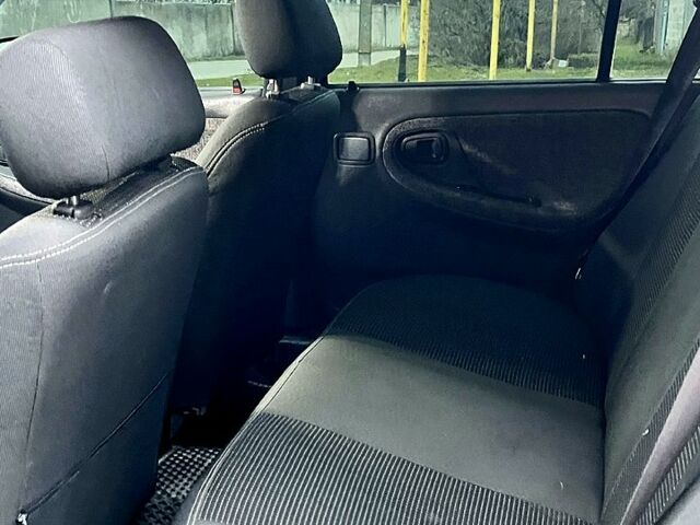 Синий Дэу Нексия, объемом двигателя 1.5 л и пробегом 324 тыс. км за 2400 $, фото 4 на Automoto.ua