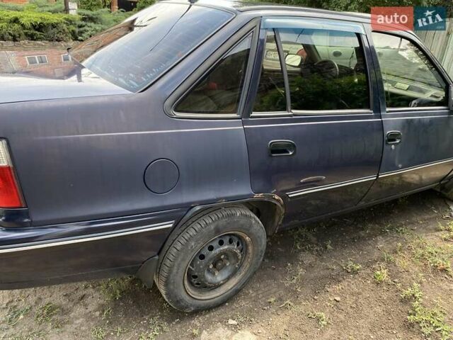 Синій Деу Нексія, об'ємом двигуна 1.5 л та пробігом 225 тис. км за 1927 $, фото 4 на Automoto.ua
