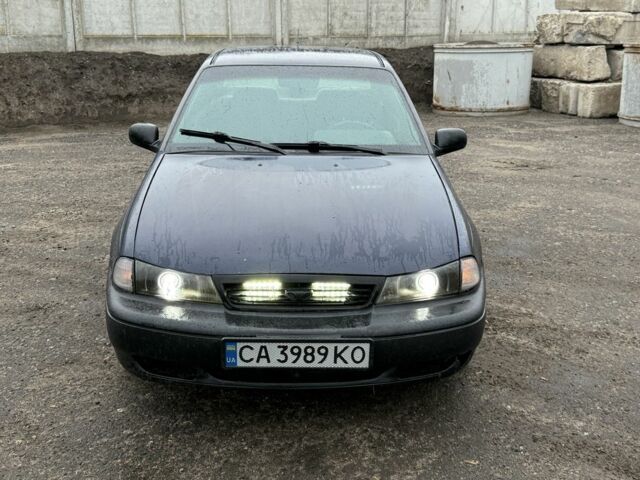 Синій Деу Нексія, об'ємом двигуна 1.5 л та пробігом 160 тис. км за 999 $, фото 1 на Automoto.ua