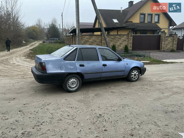 Синий Дэу Нексия, объемом двигателя 1.5 л и пробегом 300 тыс. км за 699 $, фото 2 на Automoto.ua