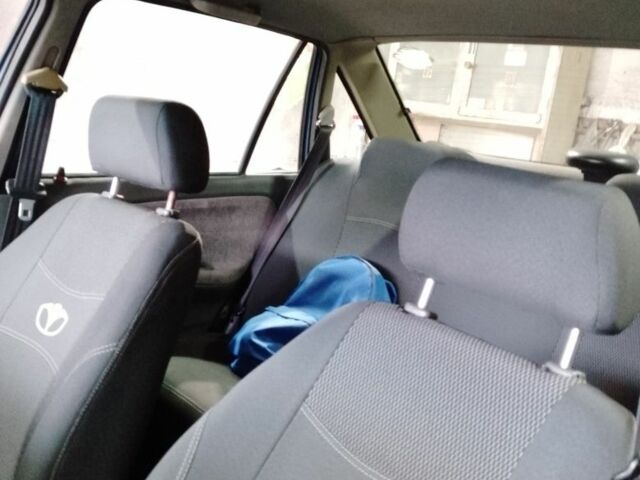 Синій Деу Нексія, об'ємом двигуна 1.5 л та пробігом 255 тис. км за 1500 $, фото 12 на Automoto.ua