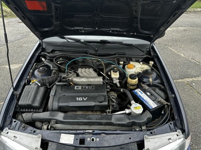 Синій Деу Нексія, об'ємом двигуна 1.5 л та пробігом 115 тис. км за 1000 $, фото 5 на Automoto.ua