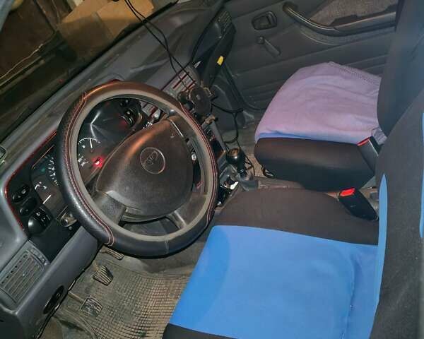 Синий Дэу Нексия, объемом двигателя 1.5 л и пробегом 158 тыс. км за 1700 $, фото 5 на Automoto.ua