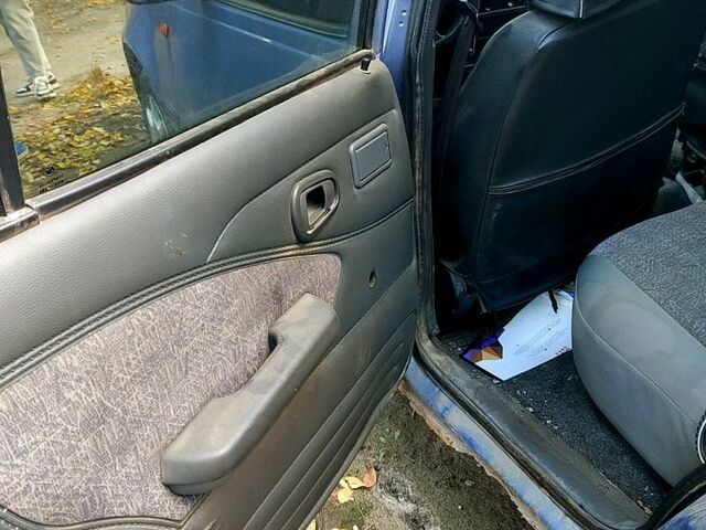 Синий Дэу Нексия, объемом двигателя 1.5 л и пробегом 228 тыс. км за 750 $, фото 7 на Automoto.ua