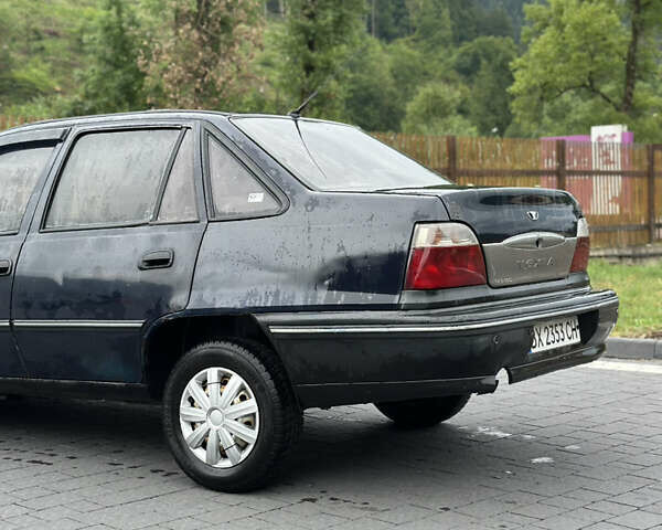 Синий Дэу Нексия, объемом двигателя 1.5 л и пробегом 200 тыс. км за 1150 $, фото 4 на Automoto.ua