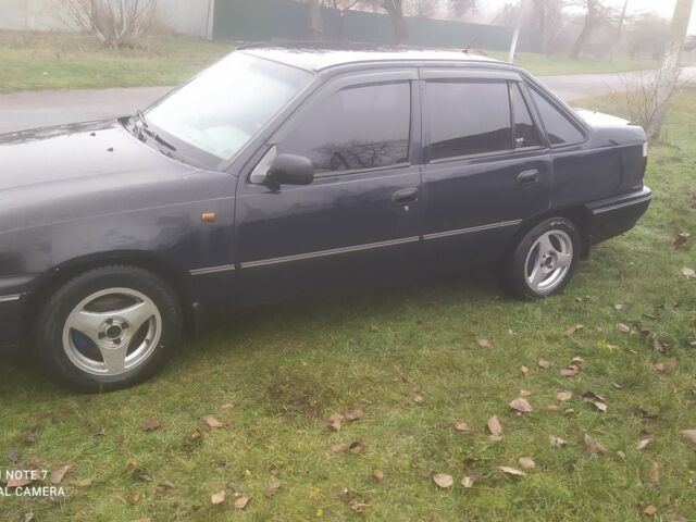 Синій Деу Нексія, об'ємом двигуна 1.5 л та пробігом 206 тис. км за 1800 $, фото 2 на Automoto.ua