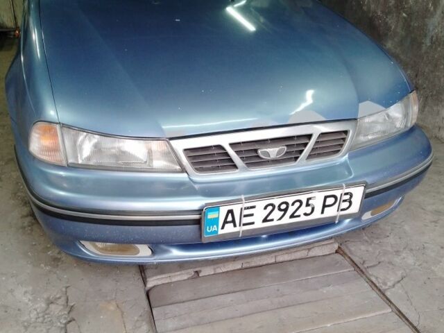 Синій Деу Нексія, об'ємом двигуна 1.5 л та пробігом 255 тис. км за 1500 $, фото 1 на Automoto.ua