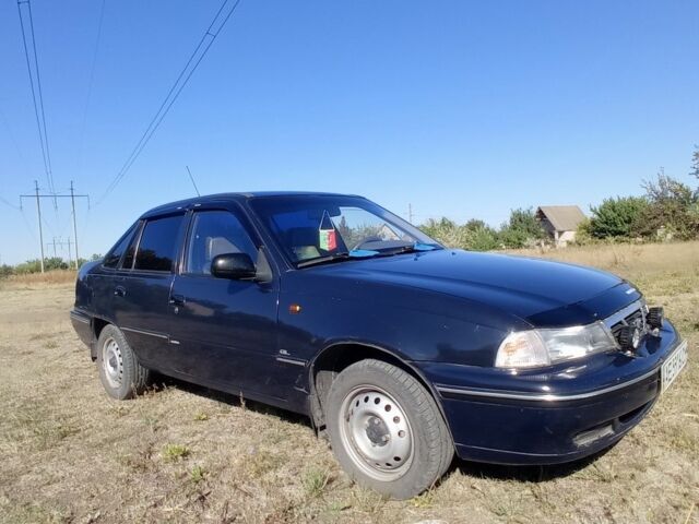 Синій Деу Нексія, об'ємом двигуна 1.5 л та пробігом 103 тис. км за 3000 $, фото 3 на Automoto.ua