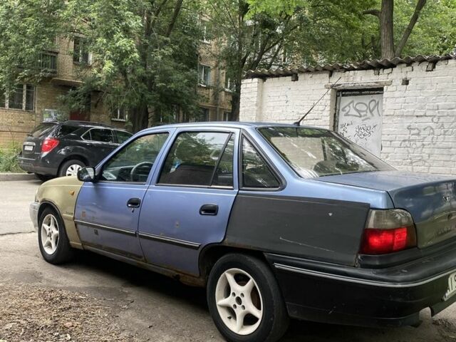 Синий Дэу Нексия, объемом двигателя 1.5 л и пробегом 354 тыс. км за 1100 $, фото 3 на Automoto.ua