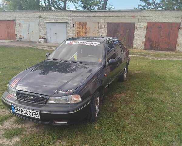Синій Деу Нексія, об'ємом двигуна 1.5 л та пробігом 240 тис. км за 1500 $, фото 5 на Automoto.ua