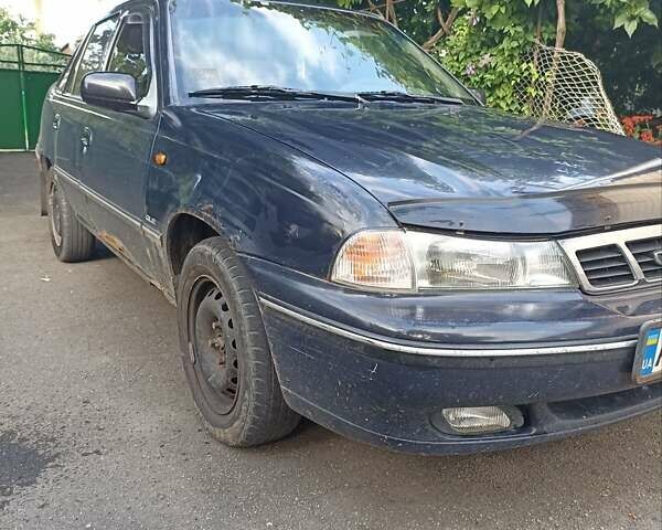 Синий Дэу Нексия, объемом двигателя 1.5 л и пробегом 136 тыс. км за 1400 $, фото 2 на Automoto.ua