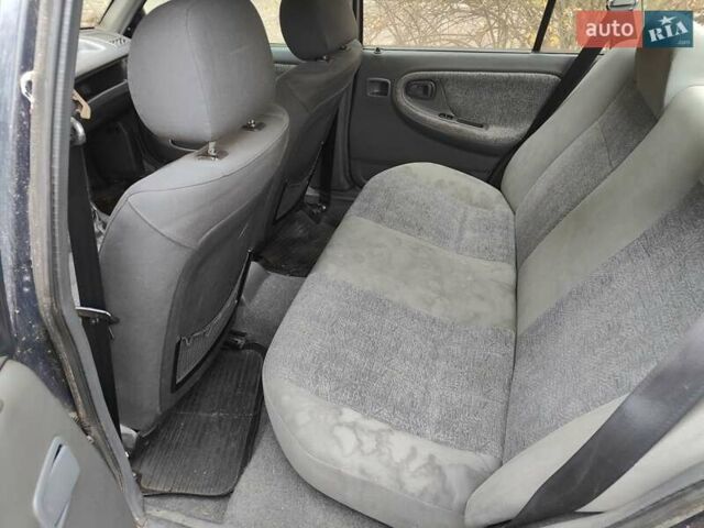 Синий Дэу Нексия, объемом двигателя 1.5 л и пробегом 227 тыс. км за 800 $, фото 3 на Automoto.ua