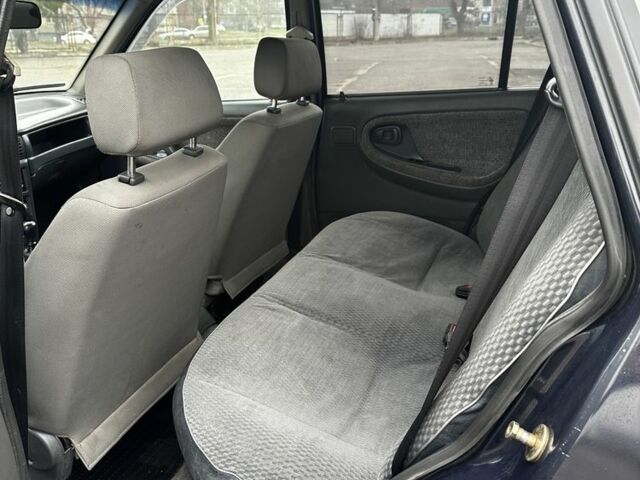 Синій Деу Нексія, об'ємом двигуна 1.5 л та пробігом 115 тис. км за 1000 $, фото 8 на Automoto.ua