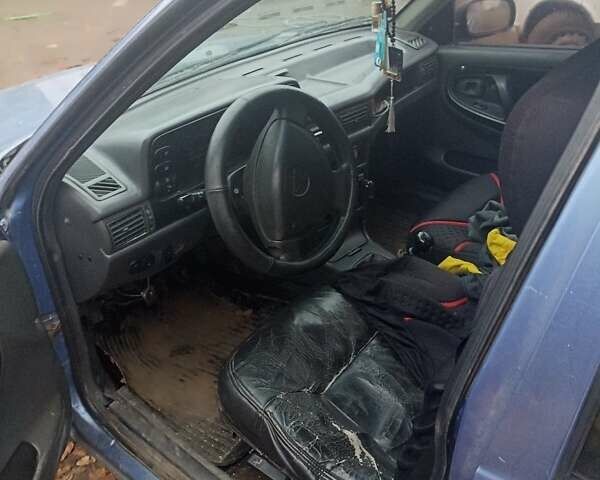 Синій Деу Нексія, об'ємом двигуна 1.5 л та пробігом 200 тис. км за 1000 $, фото 3 на Automoto.ua