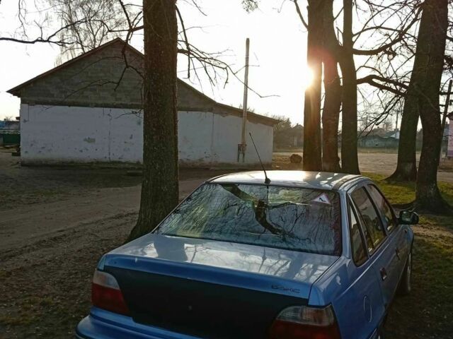 Синій Деу Нексія, об'ємом двигуна 1.5 л та пробігом 187 тис. км за 1233 $, фото 2 на Automoto.ua