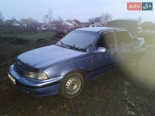 Синій Деу Нексія, об'ємом двигуна 1.5 л та пробігом 281 тис. км за 700 $, фото 1 на Automoto.ua