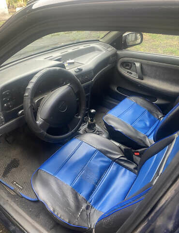 Синій Деу Нексія, об'ємом двигуна 1.5 л та пробігом 120 тис. км за 2250 $, фото 4 на Automoto.ua