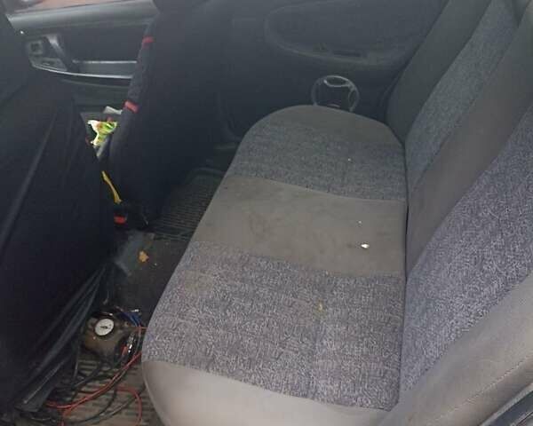 Синій Деу Нексія, об'ємом двигуна 1.5 л та пробігом 200 тис. км за 1000 $, фото 4 на Automoto.ua