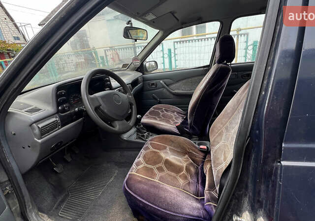 Синий Дэу Нексия, объемом двигателя 1.5 л и пробегом 140 тыс. км за 1300 $, фото 1 на Automoto.ua